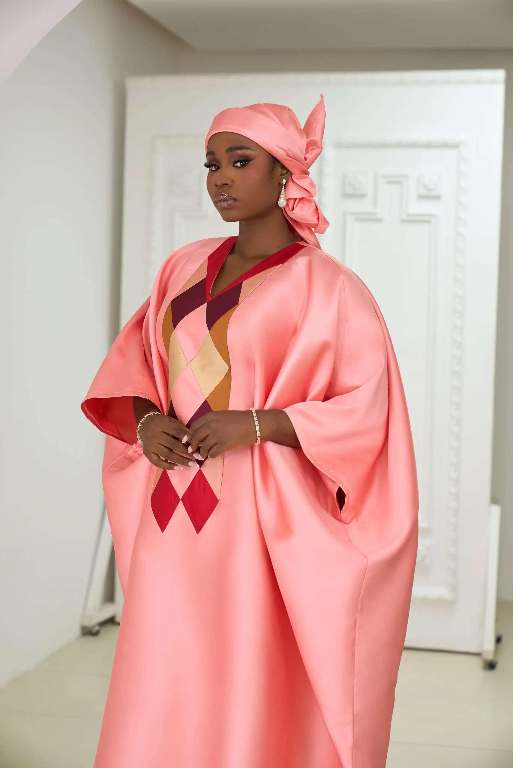 Pink Vanskere womenswear with matching headwrap